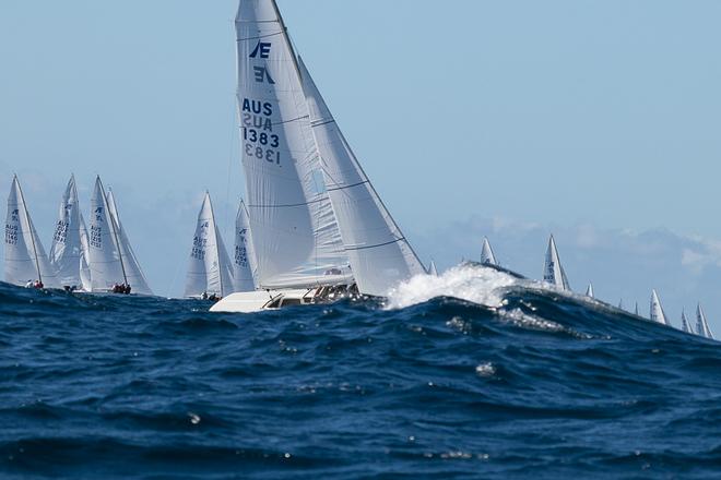 Triad working away over the waves. - 2017 Line 7 Etchells Australasian Championship ©  Alex McKinnon Photography http://www.alexmckinnonphotography.com